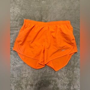Orange Nike shorts
